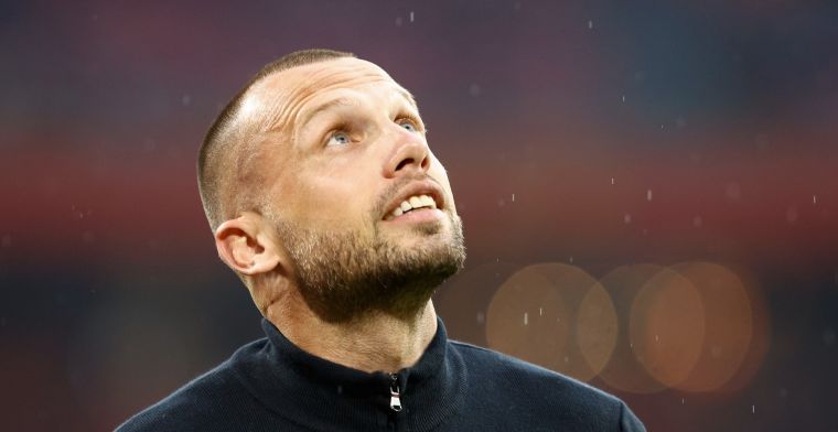 Bij welke club is John Heitinga momenteel als trainer actief?